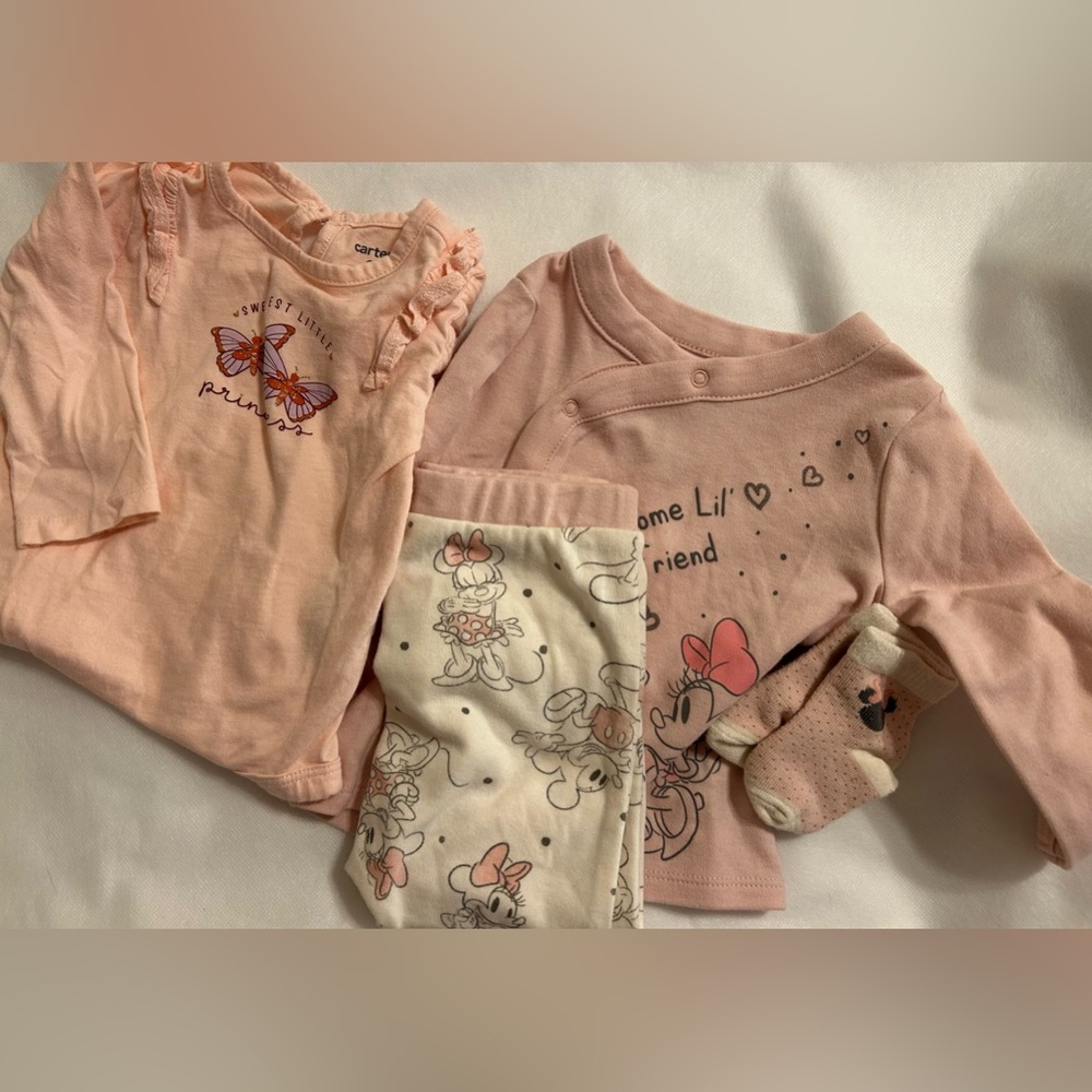 (2) 6-9mos Disney & Carter’s outfits. Disney 3 piece outfit & Carter’s onesie